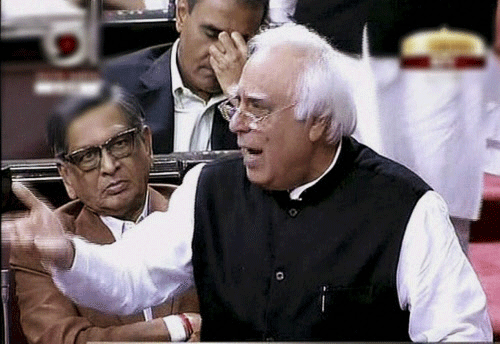 Union Communications and IT Minister Kapil Sibal speaks during Parliament's winter session in New Delhi on Tuesday. PTI Photo