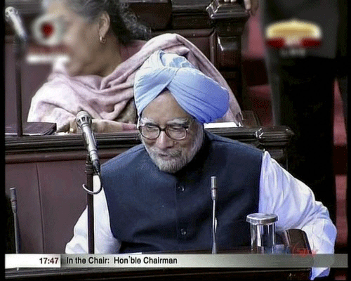 Prime Minister Manmohan Singh reacts in Rajya Sabha after it passed the anti-corruption Lokpal Bill on Tuesday in New Delhi. PTI Photo