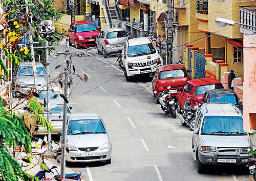 People parking their vehicles on the roadside is a common sight in the City.