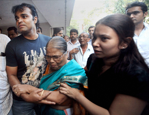 Captain Sunil James with his mother and wife Aditi at their residence in Mumbai on Friday after his release from Togo jail. PTI Photo