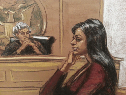 India's Deputy Consul General in New York, Devyani Khobragade, sits at her arraignment in Manhattan Federal court in New York in this sketch from December 12, 2013. India urged the United States to withdraw a visa fraud case against Khobragade, one of its diplomats, in New York on December 18, 2013 suggesting U.S. Secretary of State John Kerry's expression of regret over her treatment while in custody was not enough. REUTERS