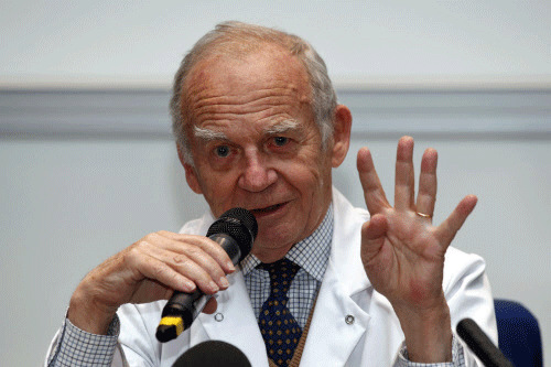 Alain Carpentier, surgeon and Carmat co-founder, attends a news conference at the Georges Pompidou European Hospital in Paris, December 21, 2013. France's Carmat said on Friday it had carried out its first implant of an artificial heart that can beat for up to five years, adding that the operation had gone smoothly. The implant operation was performed on Wednesday, the biomedical firm said in a statement. REUTERS