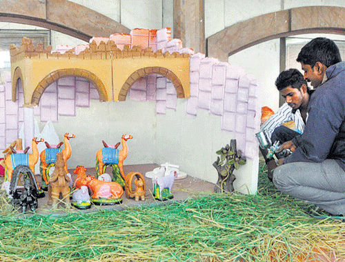 final touches A crib being set up at St Mary's Church.