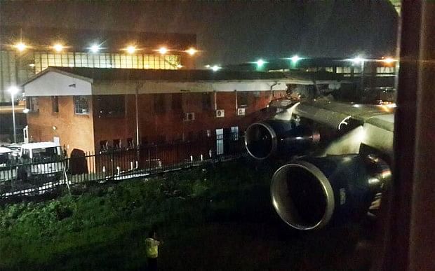 View from on board a plane that crashed into a building at Johannesburg Airport Photo: Harriet Tolputt (@HarrietTolputt)