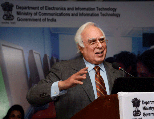 Union Minister Kapil Sibal addresses the beneficiaries of the e-inclusion Project after launching e-inclusion and e-literacy through Common Services Centres in New Delhi on Tuesday. PTI Photo
