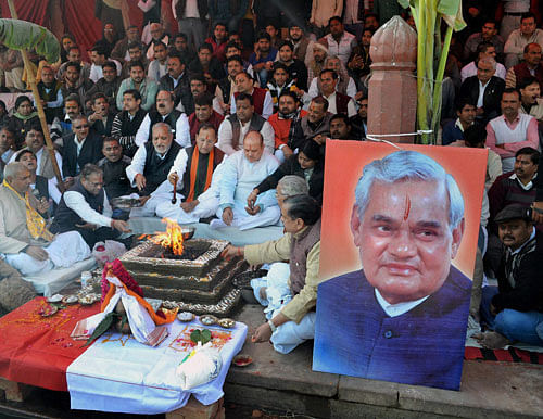 BJP activists performing 'hawan' for long life of former Prime Minister Atal Bihari Vajpyee on the occasion of his 89th birthday in Mathura on Wednesday. PTI Photo