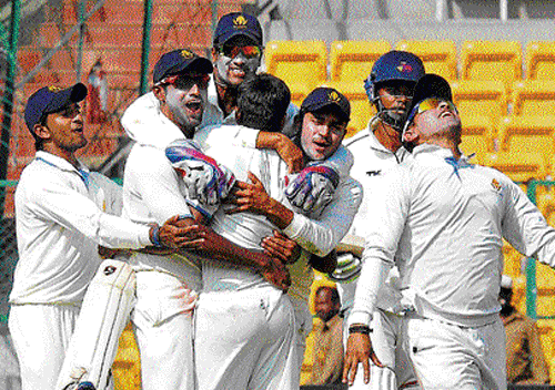 unbridled joy: Karnataka players celebrate their 160-run win over Mumbai in their Ranji Trophy tie on Wednesday. DH&#8200;PHOTO/&#8200;SRIKANTA Sharma R