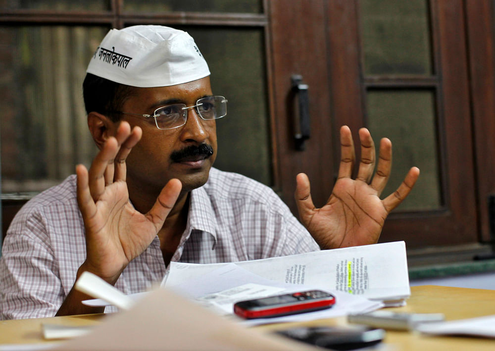 Aam Aadmi Party leader Arvind Kejriwal, who will take oath as Delhi's chief minister Dec 28,  appealed to all honest officers Thursday to approach him via SMS, emails and letters. Reuters file phtoto