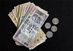 The rupee today fell for the first time in four sessions and lost 37 paise to close at a more than three-week low against the dollar on month-end demand for the US currency from importers and banks. Reuters file photo