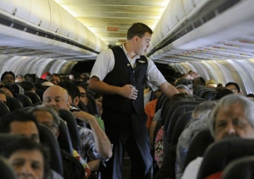 With air travellers increasingly feeling like packed sardines, flying has become a contact sport. AP File Photo.