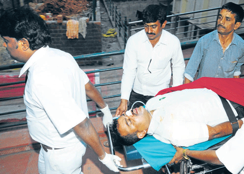 last resort: H K Lohith, one of the schoolteachers who attempted suicide during the protest at Freedom Park, is being shifted to K C General Hospital in the City on Thursday. Dh Photo