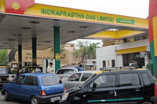 A day after hiking CNG price by a steep Rs 4.50 per kg, Indraprastha Gas Ltd today said the rate increase were forced by court orders that led to cut in allocation of cheaper domestic natural gas. Reuters File Photo.