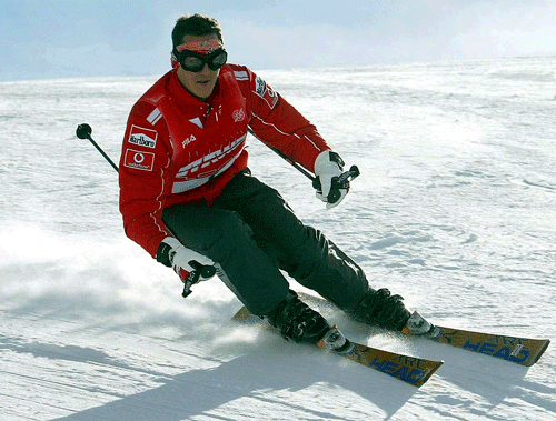 Then Ferrari's Michael Schumacher skis during a stay in the northern Italian resort of Madonna Di Campiglio in this January 16, 2004 file photo. Formula One champion Michael Schumacher suffered a serious head injury while skiing in the French Alps resort of Meribel, French media reported on December 29, 2013. REUTERS