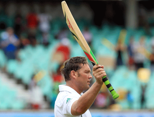 South Africa's batsman Jacques Kallis waves his bat as he salutes the fans after dismissed for 115 runs on the forth day of their cricket test match against India at Kingsmead stadium in Durban, South Africa, Sunday, Dec. 29, 2013. AP Photo