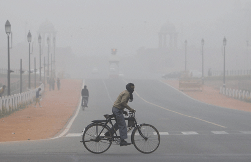 Delhi recorded the lowest minimum temperature in a decade for the month of December as mercury dipped to a chilling 2.4 degrees this morning. PTI Photo.