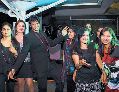 Ajmal (third from left) at a party.