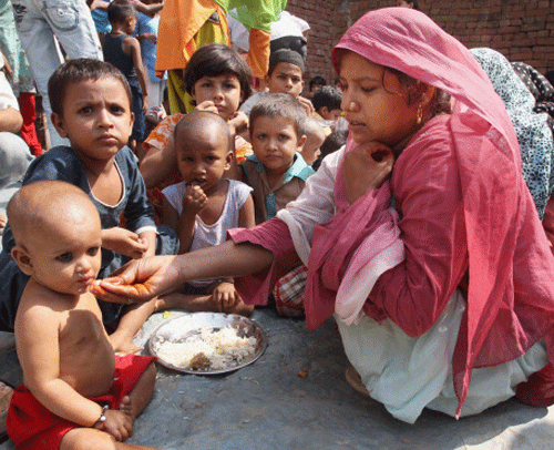 Facing flak over deaths of children at relief camps, the Uttar Pradesh Government today shifted 420 riot victims from Loee camp in the district to vacant buildings to protect them from severe cold wave sweeping the state. PTI File Photo.