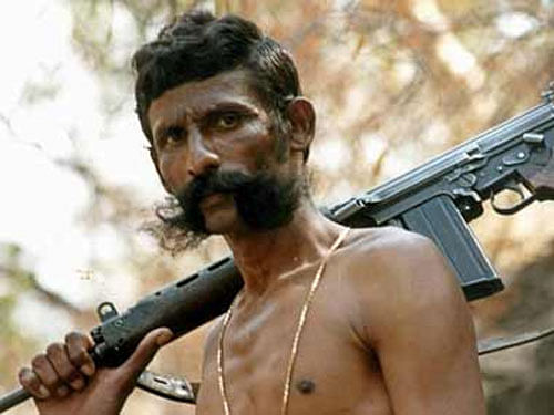 Smugglers connected with slain forest brigand Veerappan's gang may be involved in smuggling of red sanders wood in Andhra Pradesh, state police chief B. Prasada Rao said Tuesday. Reuters file photo of Veerappan