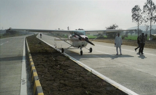 A four-seater private plane made an emergency landing on a busy highway at Betul, Madhya Pradesh on Tuesday. PTI Photo