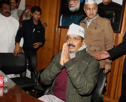 Delhi Chief Minister Arvind Kejriwal interacts with the media during the first day of Delhi Legislative Assembly Session, in New Delhi on Wednesday. PTI Photo