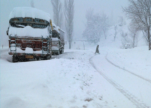 The Srinagar-Jammu national highway connecting Kashmir with the rest of the country remained closed for the third consecutive day today as the Valley and Ladakh region reeled under intense cold conditions with the night temperature in Pahalgam plunging to the season's lowest of minus 12.2 degrees Celsius. PTI
