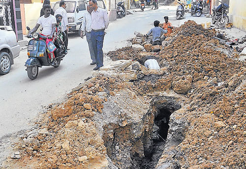 A dug-up road near the Old Cemetery Road in Shivajinagar.  DH PHOTOS by bh shivakumar