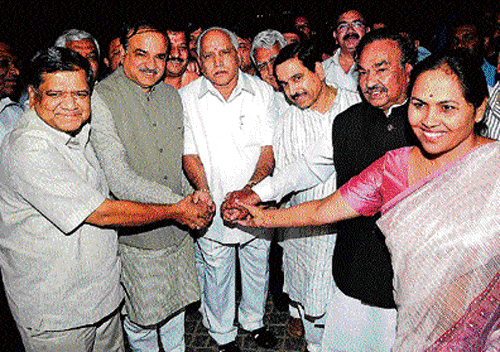 ALL smiles: BJP&#8200;leaders Jagadish Shettar, Ananth Kumar, Pralhad Joshi and K S Eshwarappa greet KJP&#8200;leaders B S Yeddyurappa, C M Udasi, Shobha Karandlaje and others in Bangalore on Thursday. dh photo