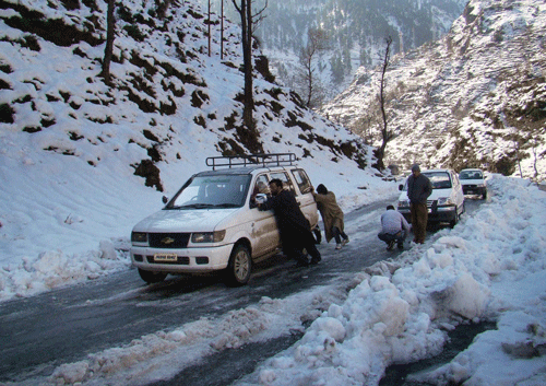 The Srinagar-Jammu national highway connecting Kashmir with the rest of the country was opened for one-way traffic today, three days after heavy snowfall forced its closure. PTI