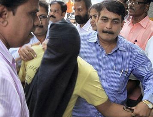 PTI file photo of one of the accused being taken to court in Mumbai.