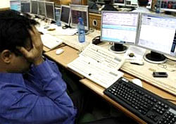 After dropping 157 points in early trade amid weak global cues, the Sensex today recouped some losses in the latter half on the back of continued strength in IT stocks to end the day with a 37-point fall. Reuters file photo