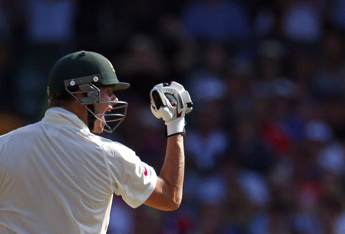 Australia's Steve Smith celebrates reaching his century during the first day of the fifth Ashes cricket test against England at the Sydney cricket ground January 3, 2014. REUTERS