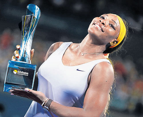 who can stop me? Serena Williams is a picture of delight after winning the Brisbane International on&#8200;Saturday. reuters