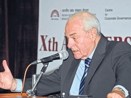Mervyn King S C, an academician from South Africa, delivers a lecture at the IIM-B in the City, on Saturday. Dh Photo