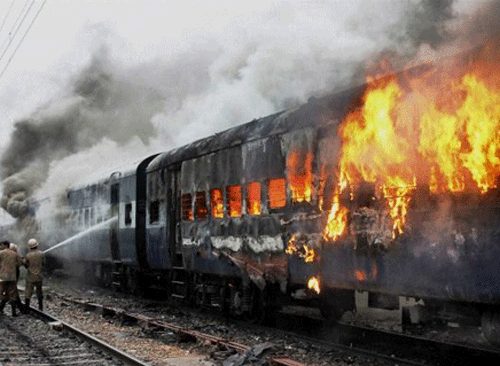 Against the backdrop of frequent fire mishaps, Railways are planning to set up a fire test laboratory to develop strong fire retardant materials for coaches and make AC compartment doors operable from both sides. PTI File Photo.