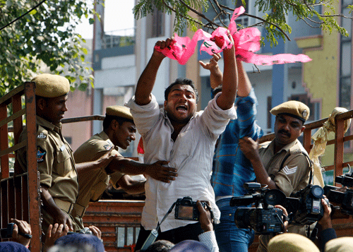 Police detain Telangana student activists, demanding for a separate Telangana state, as they shout slogans against Seemandhra Members of Parliament who went on hunger strike in protest against the proposed bifurcation of the state of Andhra Pradesh, during a protest in Hyderabad. AP