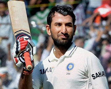 India's batting sensation Cheteshwar Pujara climbed two places to be at fifth spot, while Virat Kohli slipped a position at number 11 in the latest ICC Test rankings issued today. PTI File Photo