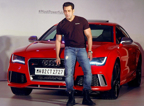 Mumbai : Bollywood Actor Salman Khan during the launch of Sporty spearhead Audi RS 7 Sportback car for Indian market and takes handover of first Audi RS 7 sportback by Audi in Mumbai on Monday. PTI Photo