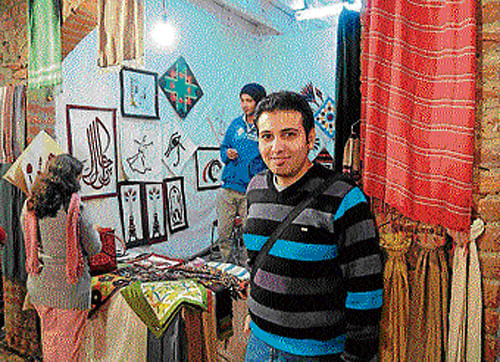 Ramy Mohamed Hassan has brought traditional art and crafts from Egypt at Dastkari Haat Samiti's craft bazaar in Dilli Haat. DHNS