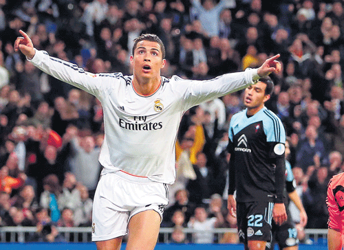 JUBILANT: Real Madrid's Cristiano Ronaldo celebrates his goal against Celta Vigo at the Santiago Bernabeu on Monday. The Portuguese striker notched his 400th goal during the encounter. AP