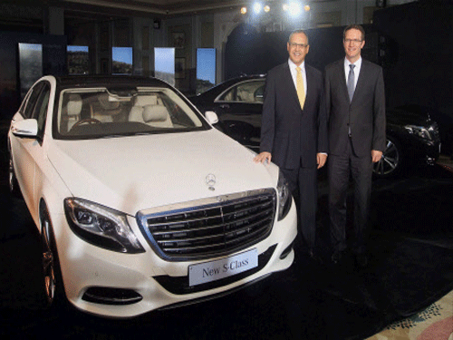 Head of Global Product Management for Mercedes Benz S-Class and Roadsters Lutz Regelmann with Managing Director of Mercedes-Benz India Eberhard Kern during the launch of new Mercedes Benz S-Class in New Delhi on Wednesday. PTI Photo