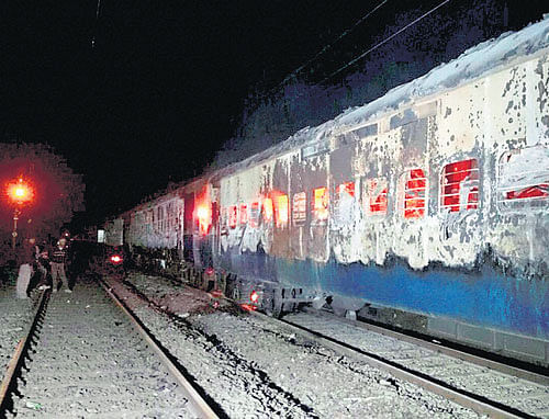 Coaches of the Mumbai-Dehradun Express which caught fire near Dahanu in Thane district on Wednesday. PTI