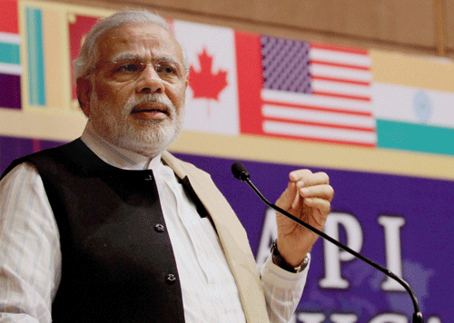 Gujarat Chief Minister Narendra Modi addresses Non resident Indian doctors during American association of physician of Indian origin (AAPI) at Global Health Care Summit in Ahmedabad on Friday. PTI Photo