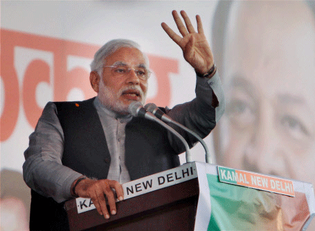 Bharatiya Janata Party's (BJP) mascot for the 2014 poll Narendra Modi on Thursday took a not-so-subtle dig at Prime Minister Manmohan Singh while addressing a conclave of expatriate Indians organised by the Centre. PTI file photo
