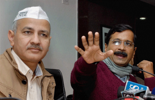 Delhi Chief Minister Arvind Kejriwal and PWD Minister Manish Sisodia during a press conference in New Delhi. File photo - PTI