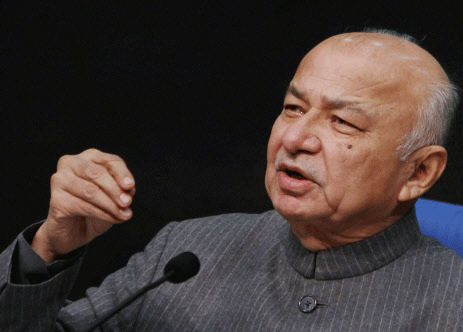 Union Home Minister Sushilkumar Shinde addresses his ministry's monthly press conference in New Delhi on on Friday. PTI Photo