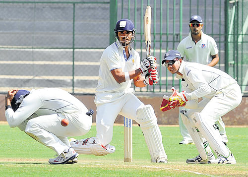 Forceful: Karnataka's KL Rahul pulls en route his 92 against Uttar Pradesh on the third day of the Ranji Trophy quarterfinal match at the M&#8200;Chinnaswamy stadium on Friday. DH PHOTO