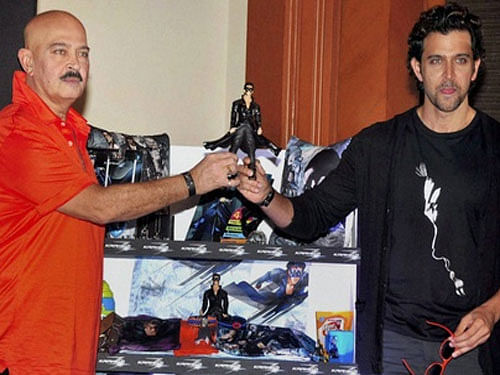 Bollywood actor Hrithik Roshan (right) and his father director Rakesh Roshan during a promotional event of their upcoming film 'Krrish 3'. PTI File Image