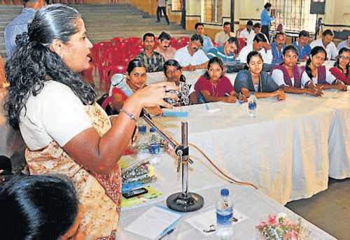 Women's Commission former chairperson Manjula speaks at a round table conference organised by ABVP  to discuss on 'the safety of women - healthy society,' at SDM Law College in Mangalore on Saturday. dh photo