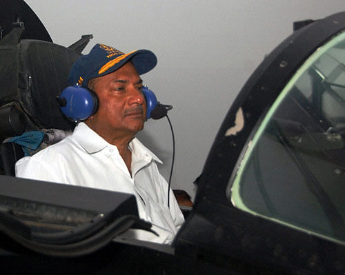 Defence Minister AK Antony sitting in the cockpit of a MiG-29 K fighter plane that was commissioned into Navy at a function held at the Naval Base INS Hansa in Goa / PTI file photo