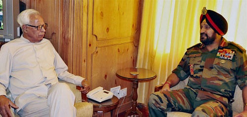 Jammu and Kashmir Governor N.N Vohra with Army Chief Gen. Bikram Singh during their meeting at Raj Bhawan in Srinagar on Monday. PTI Photo